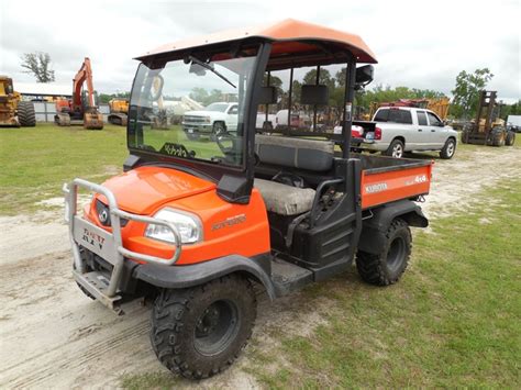 Kubota RTV 4x4 side by side 1298 hrs showing dsl, electric dump