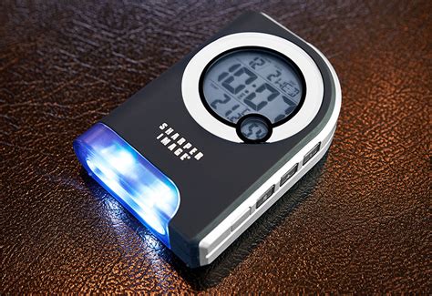 Travel Alarm Clock with Dual LED Flashlight @ Sharper Image