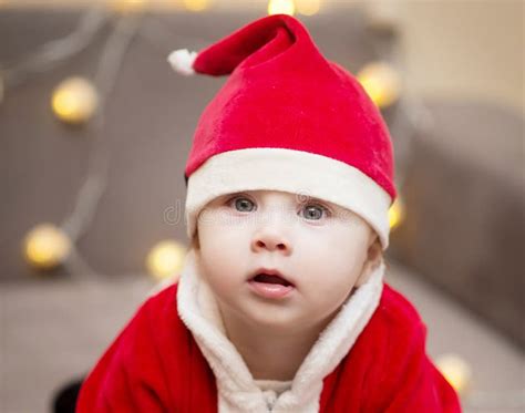 Baby Boy in Santa Costume. Christmas. Indoor Stock Image - Image of tree, background: 132375207