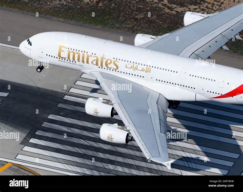 Emirates Airline Airbus A380 aircraft landing. Aerial view of Emirates Airlines A380-800 ...