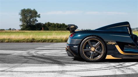 Koenigsegg Regera And Agera RS With Blue Carbon Finish, Gold Accents Meet