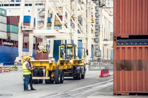 Two Dock Workers At Shipyard High-Res Stock Photo - Getty Images