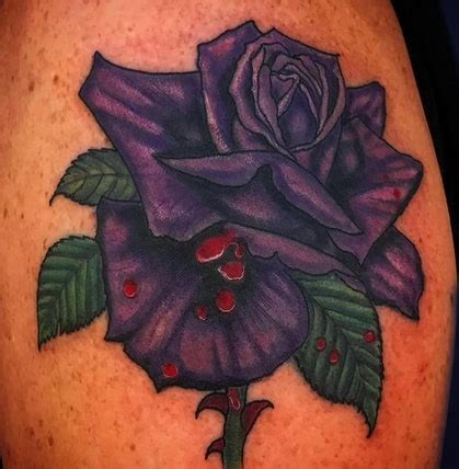 What Does a Black Rose Tattoo Mean? | TattooAdore