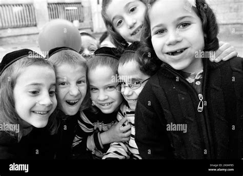 Cheerful & happy. Orthodox Jewish boys having fun in the courtyard of their Yeshiva in Jerusalem ...