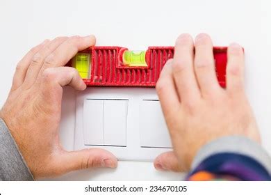 Electrician Installing Light On Wall Using Stock Photo 234670105 | Shutterstock
