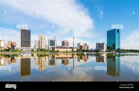 A panoramic view of downtown Toledo Ohio's skyline reflecting into the ...