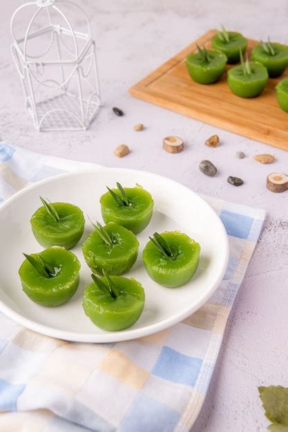 Premium Photo | Kue lumpang pandan or kue ijo kue ijo is a traditional ...