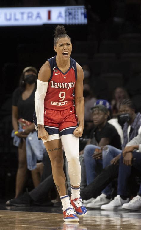 Washington Mystics guard Natasha Cloud (9) celebrates after making a ...