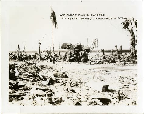 The wreckage of a war damaged Japanese float plane on Kwajalein Atoll ...