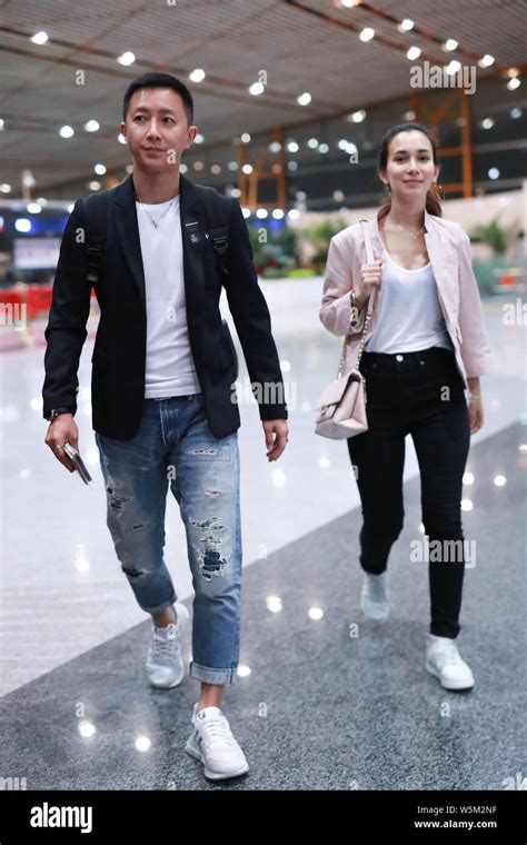 Chinese actor Han Geng, left, and his American actress girlfriend Celina Jade arrive at the ...