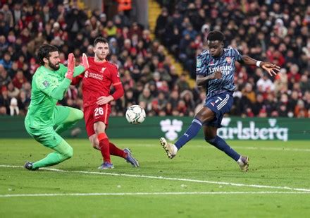 Liverpool Goalkeeper Alisson Becker Saves Bukayo Editorial Stock Photo ...