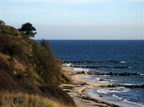 Asisbiz Ecology local white sand beaches dot the coastline Bornholm Denmark 04