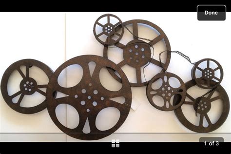 Movie film reel wall art idea from Hobby Lobby. Mine will be bigger and with real reels. | Movie ...