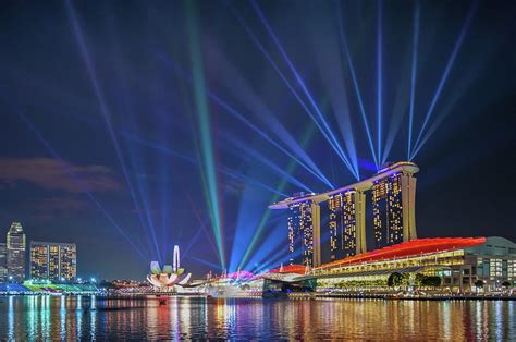 Marina Bay Light Show Photograph by Coolbiere Photograph - Pixels