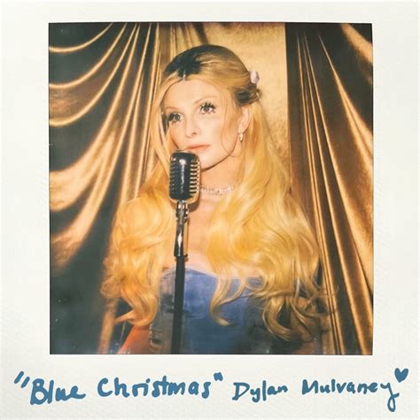 Watch Dylan Mulvaney Cover “Blue Christmas” in a Dreamy Music Video | Them