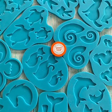 Fun assortment of silicone molds that are great for polymer clay and mixed media projects ...