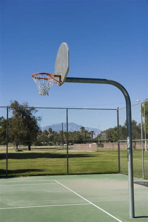 Playground basketball hoop stock photo. Image of springs - 30841448