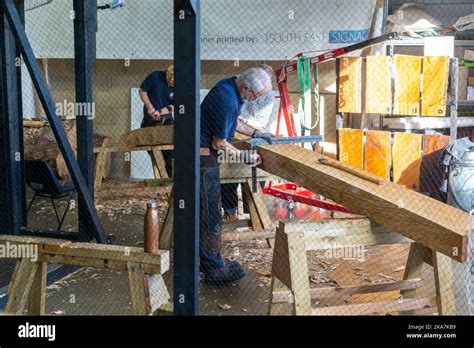 Craftsmen working on reconstruction of Anglo-Saxon ship from Sutton Hoo, Longshed building ...