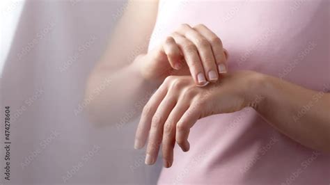 Skin care concept. Woman uses hand cream. Stock Video | Adobe Stock