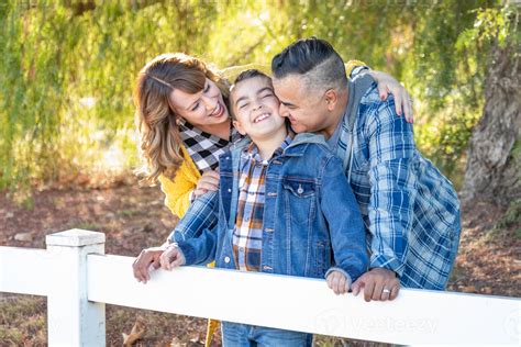 Mixed Race Family Portrait Outdoors 16433825 Stock Photo at Vecteezy