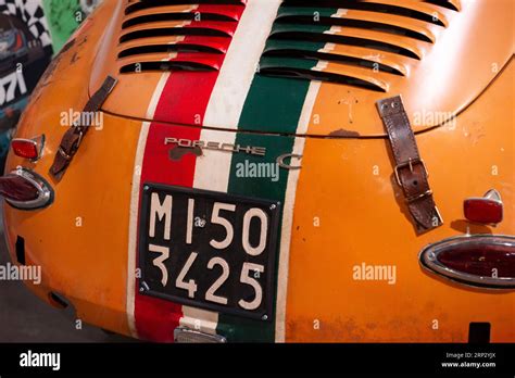 Rear view of orange Porsche 356 C 1600 racing car from 1964 with Italian number plate, Italian ...