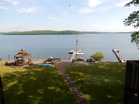 The private dock of this gorgeous lakefront property in Lake Wallenpaupack, PA has enough space ...