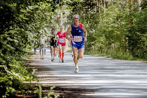 Best Old Man Running Marathon Stock Photos, Pictures & Royalty-Free ...