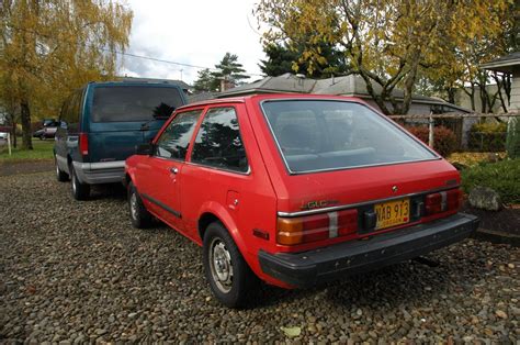 OLD PARKED CARS.: 1985 Mazda GLC.