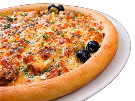 Chicken Tikka Pizza by Domino’s Pizza - Sahulat Bazar