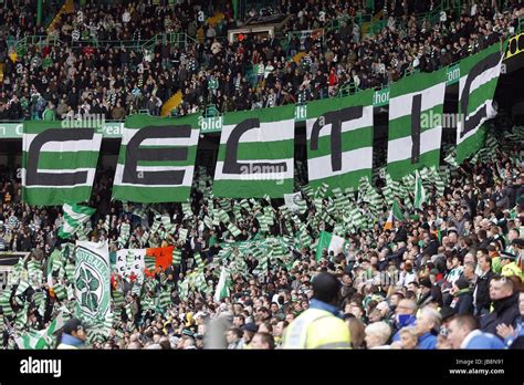 CELTIC FANS WITH BANNERS CELTIC V RANGERS CELTIC PARK GLASGOW SCOTLAND ...