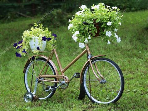 Vintage garden bicycle Stock Photo by ©nneiole 12242516