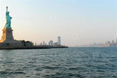 Statue of Liberty at sunset from New York City 16172128 Stock Photo at Vecteezy