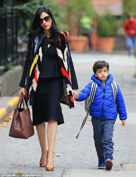 Huma Abedin wore a MINK vest on the school run | Dark skirts, Fur gilet ...