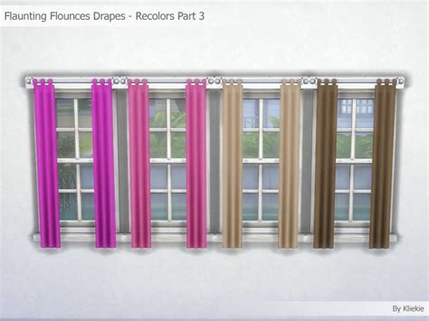 four different colored curtains hanging in front of a window with the ...