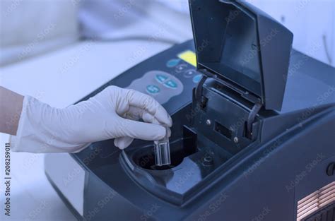 Determination of bacterial growth by the optical density using spectrophotometer Stock Photo ...