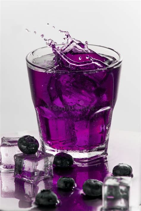 Cocktails with blueberries stock photo. Image of drink - 71606214