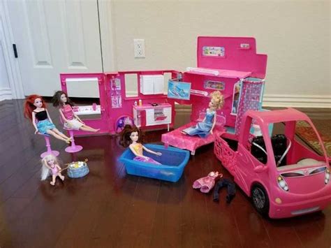 Barbie Camper van with accessories. %2445 includes 5 barbies and clothes. %28Three are Disney ...