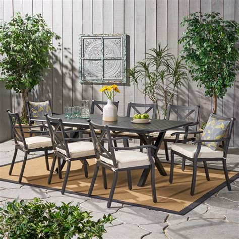 Cascada Outdoor 9 Piece Cast Aluminum Dining set with Expandable Dining Table and Water ...
