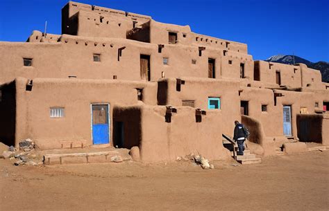 An adobe home in Taos Pueblo, an ancient Native American community near the modern city of Taos ...