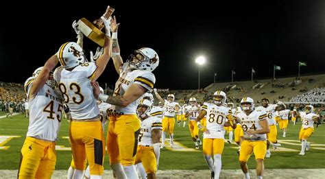 LOOK: Wyoming football unis through the years