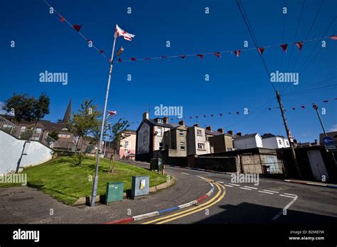 Unionist flags and colours painted on the kerb in The Fountain district of Londonderry, County ...