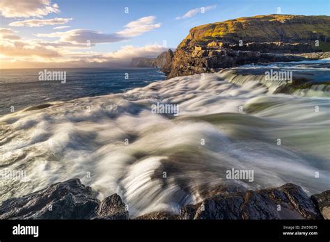 Bosdalafossur waterfall at sunset, Sorvagsvatn, Vagar, Faroe Islands ...