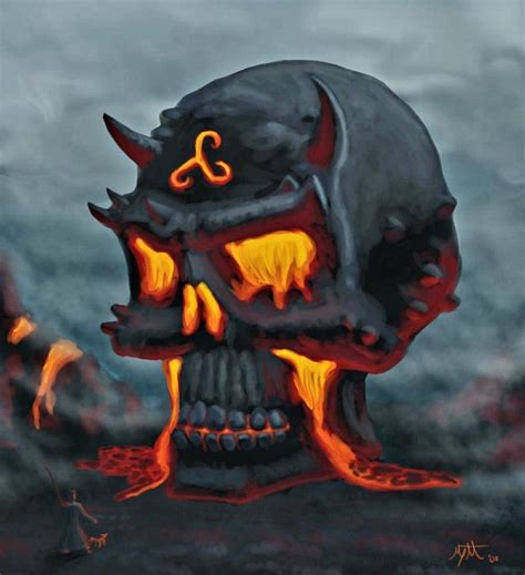 a skull with horns and flames on its face