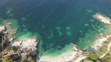 Drone pullback over idyllic beaches and coastline of Kassiopi, Corfu, Greece Stock Video | Adobe ...