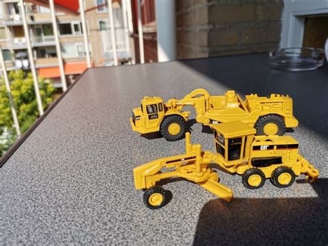 Norscot 1:87 - 627G/163H - Modelauto´s - Cat Caterpillar - Catawiki