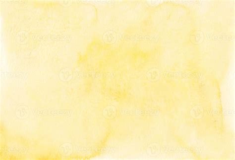 Watercolor pastel yellow background texture. Light sandy yellow color stains on paper, hand ...