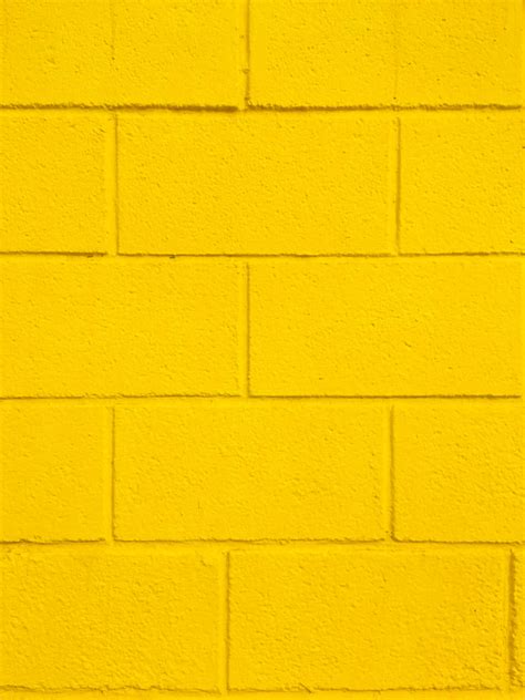 Download Cute Pastel Yellow Brick Wall Wallpaper | Wallpapers.com
