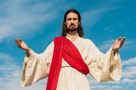 Jesus with Outstretched Hands Holding Wooden Cane Stock Image - Image of outdoors, outside ...