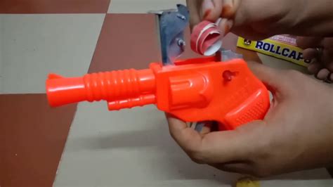 Orange Plastic Toy Cap Gun with Paper Roll Caps - Age above five years - YouTube