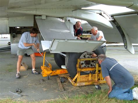 Changing the tires on the prototype: Boeing 727 N7001U | Boeing 727 ...